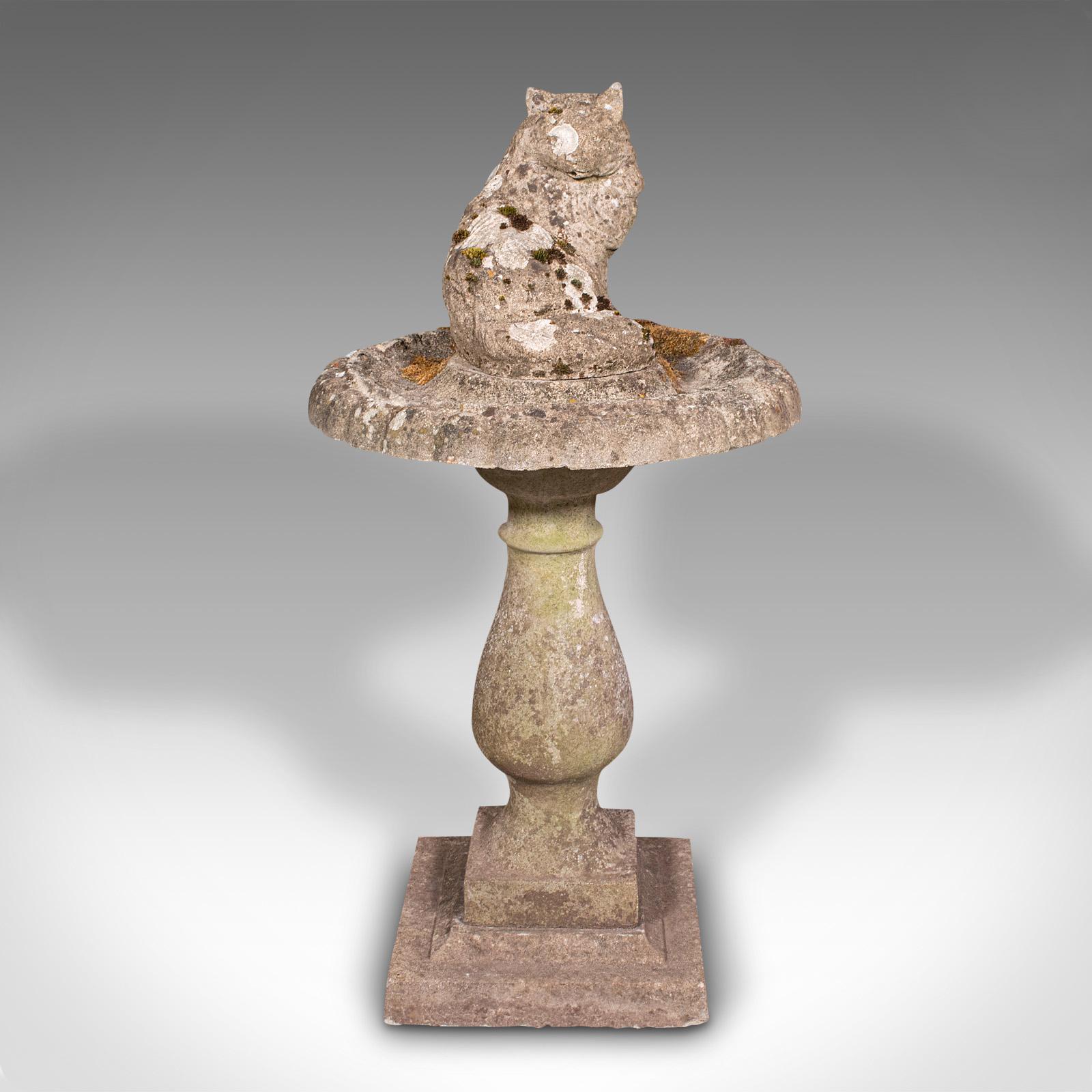 This is a vintage garden bird bath. An English, York Stone decorative outdoor ornament, dating to the mid 20th century, circa 1950.

Accentuate your garden with this charming, cat-topped bird bath
Displays a desirable aged patina throughout, with
