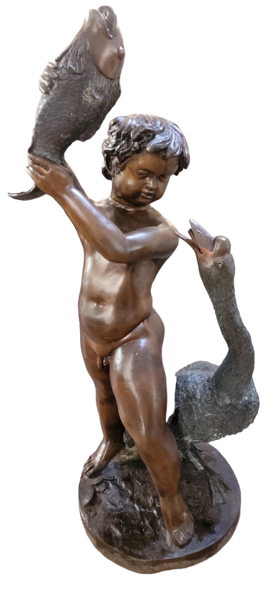 Vintage Garden Fountain Of Boy, Koi fish and Goose In Good Condition For Sale In Pasadena, CA