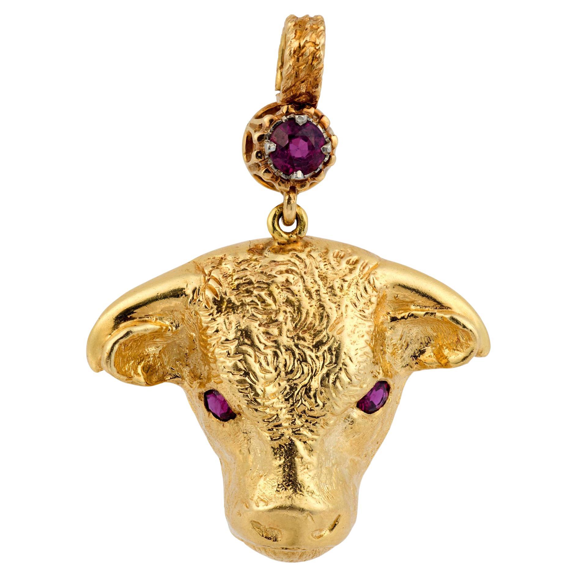 Vintage garnet 14k yellow gold bull pendant