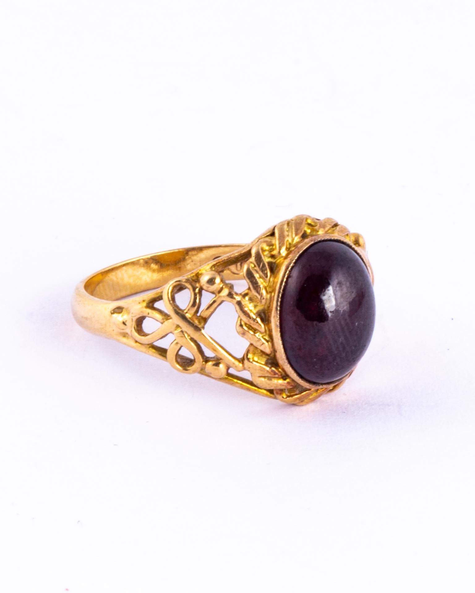 Set within this glossy 9ct gold ring is a gorgeous deep red cabochon garnet. The shoulders and setting are wonderfully ornate. 

Ring Size: M 1/2 or 6 1/2 
Stone Dimensions: 10x8mm 

Weight: 3.4g