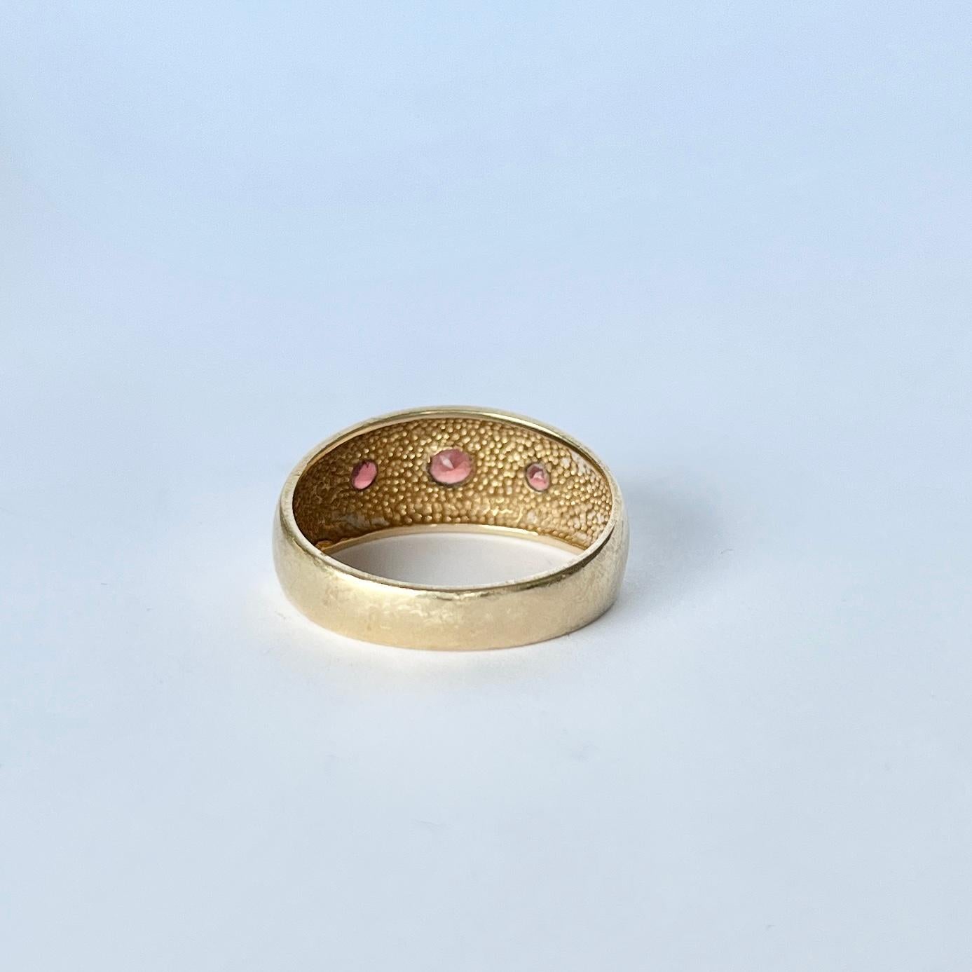Round Cut Vintage Garnet and 9 Carat Gold Three-Stone Ring For Sale