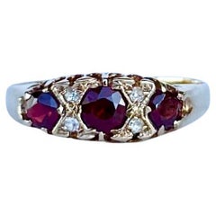 Dreisteiniger Vintage-Ring aus 9 Karat Gold mit Granat und Diamant