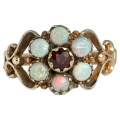 Bague vintage en or 9 carats avec grenat et opale