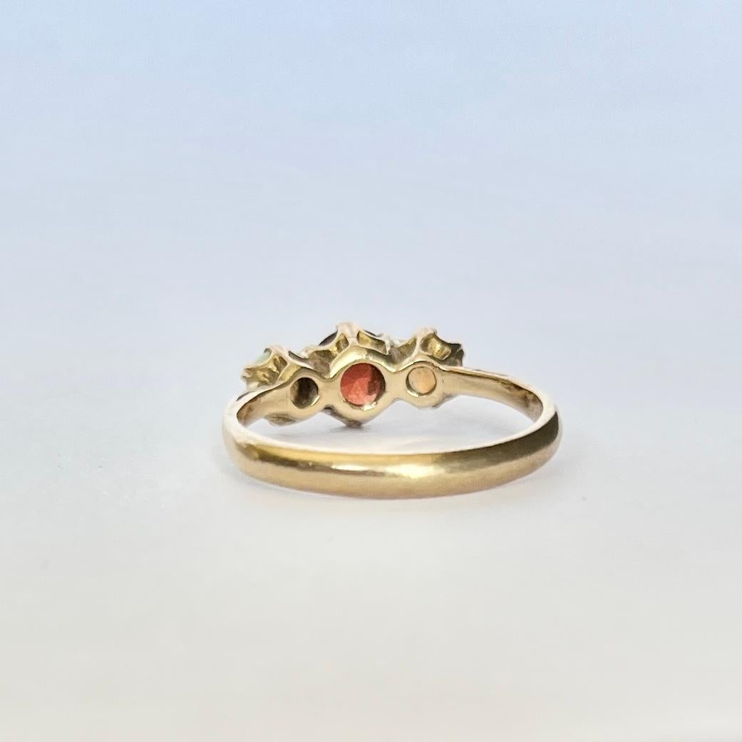 Round Cut Vintage Garnet and Opal 9 Carat Gold Three-Stone Ring For Sale