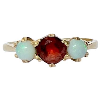 Vintage Garnet and Opal 9 Carat Gold Three-Stone Ring For Sale