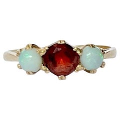 Vintage Garnet and Opal 9 Carat Gold Three-Stone Ring