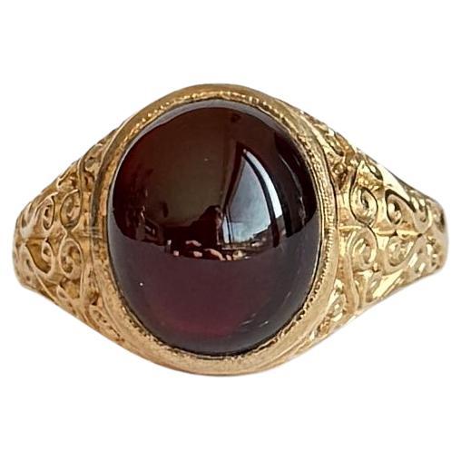 Anello con granato cabochon e oro 9 carati d'annata