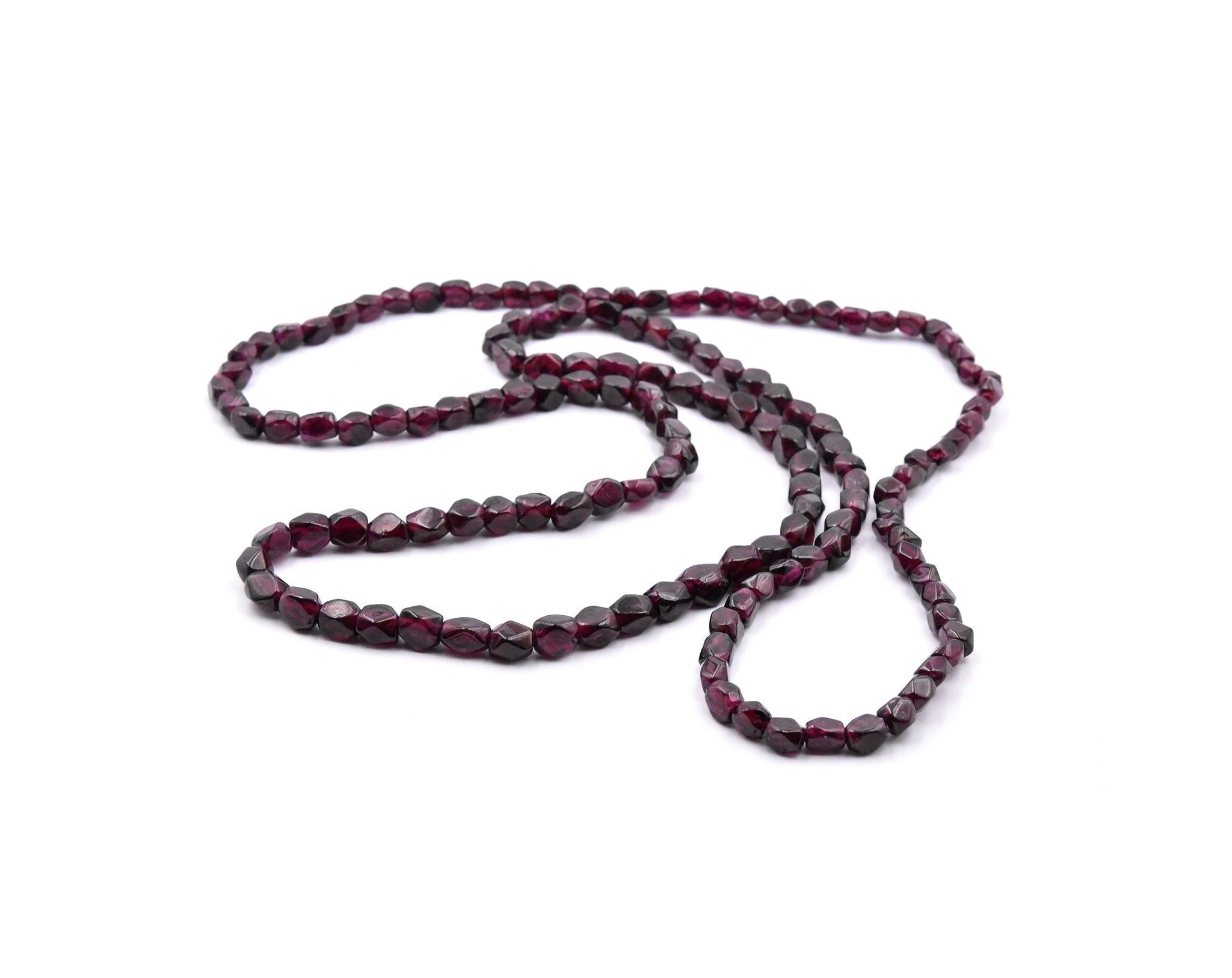 Material: Garnet beads
Dimensions: necklace is 34-inches in length, beads are about 6mm wide
Weight: 64.8 grams
