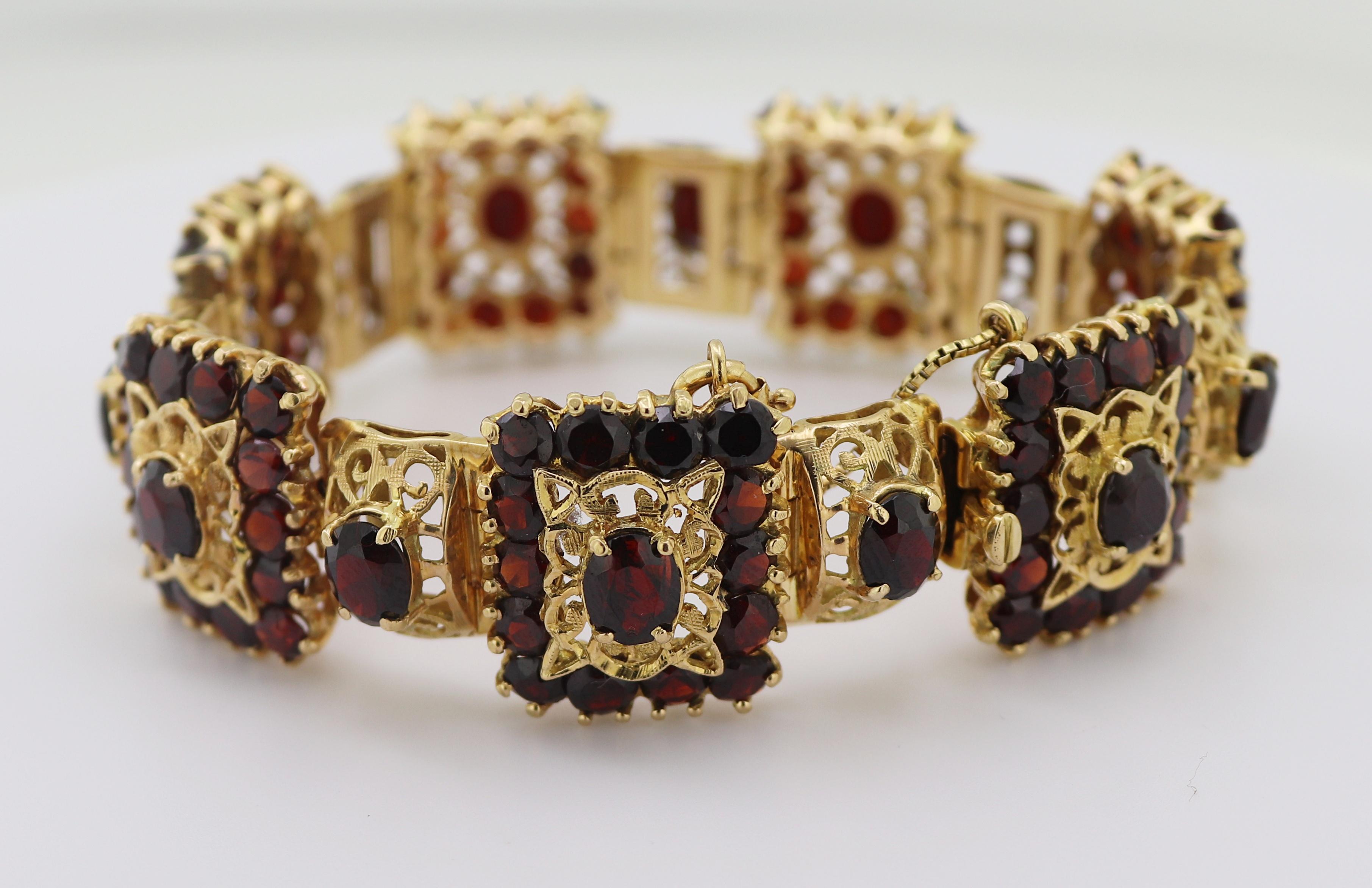 Suite aus Granat-, Gelbgold-Armband und Ringschmuck im Angebot 1