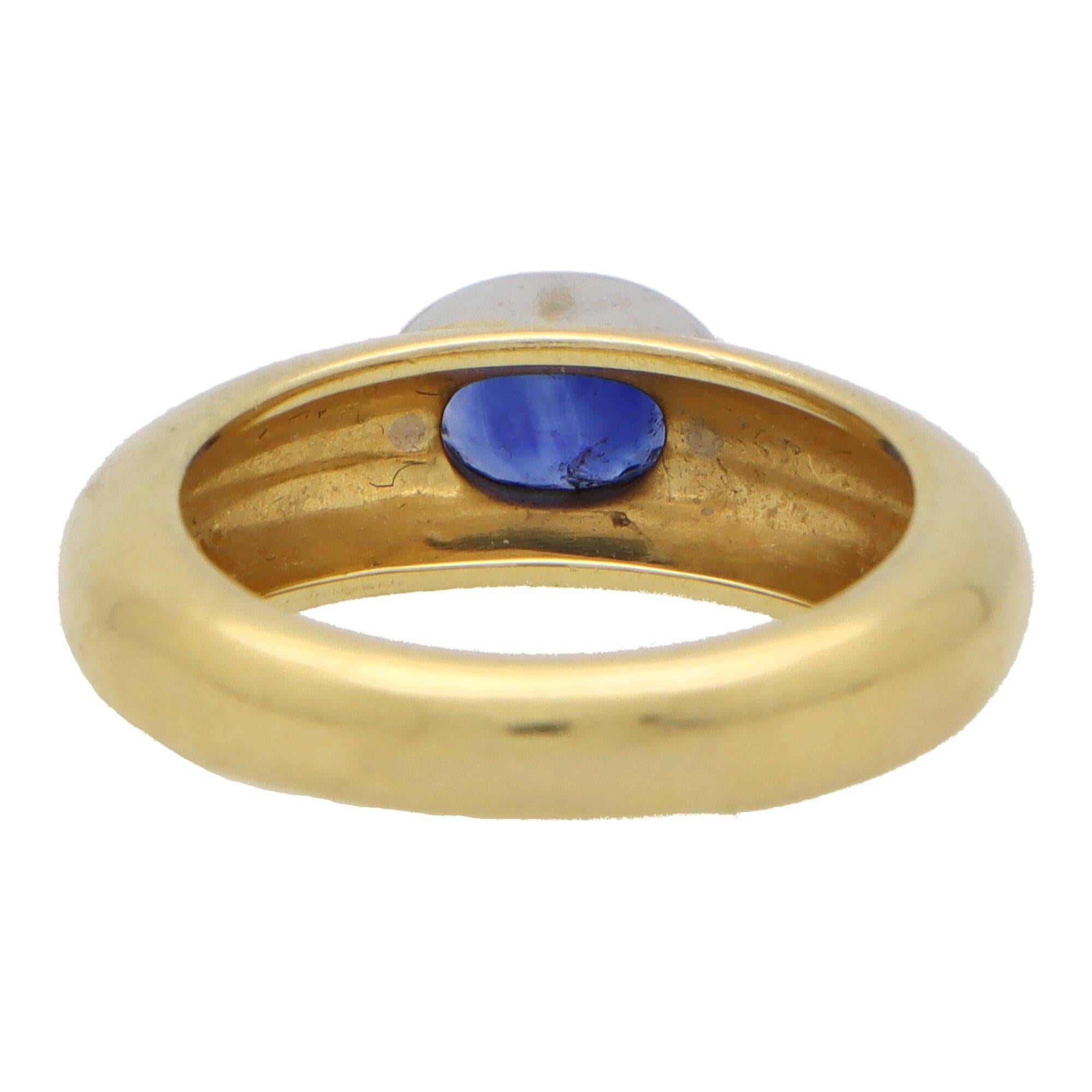 Oval Cut  Vintage Garrard & Co. Blue Sapphire Gypsy Set Ring in 18k Yellow and White Gold For Sale