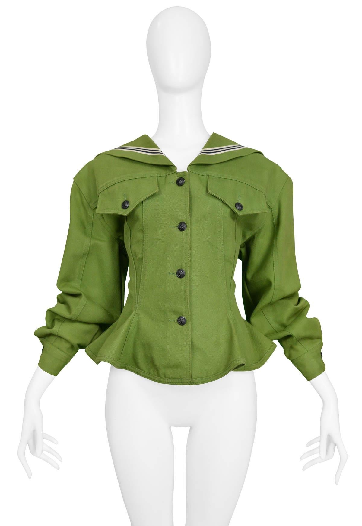 Vintage Jean Paul Gaultier olive green sailor jacket featuring a striped sailor style lapel, double lace up detailing up the the back and double pockets at the chest.


Excellent Vintage Condition.

Size Medium.