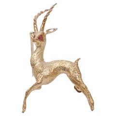 Spilla gazzella vintage in oro giallo 14k con occhi di rubino