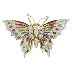 Broche papillon vintage sertie de pierres précieuses