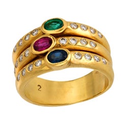 Anillo vintage de triple banda de oro amarillo de 18 quilates con piedras preciosas y diamantes