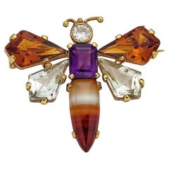 Broche vintage de piedra preciosa con forma de insecto