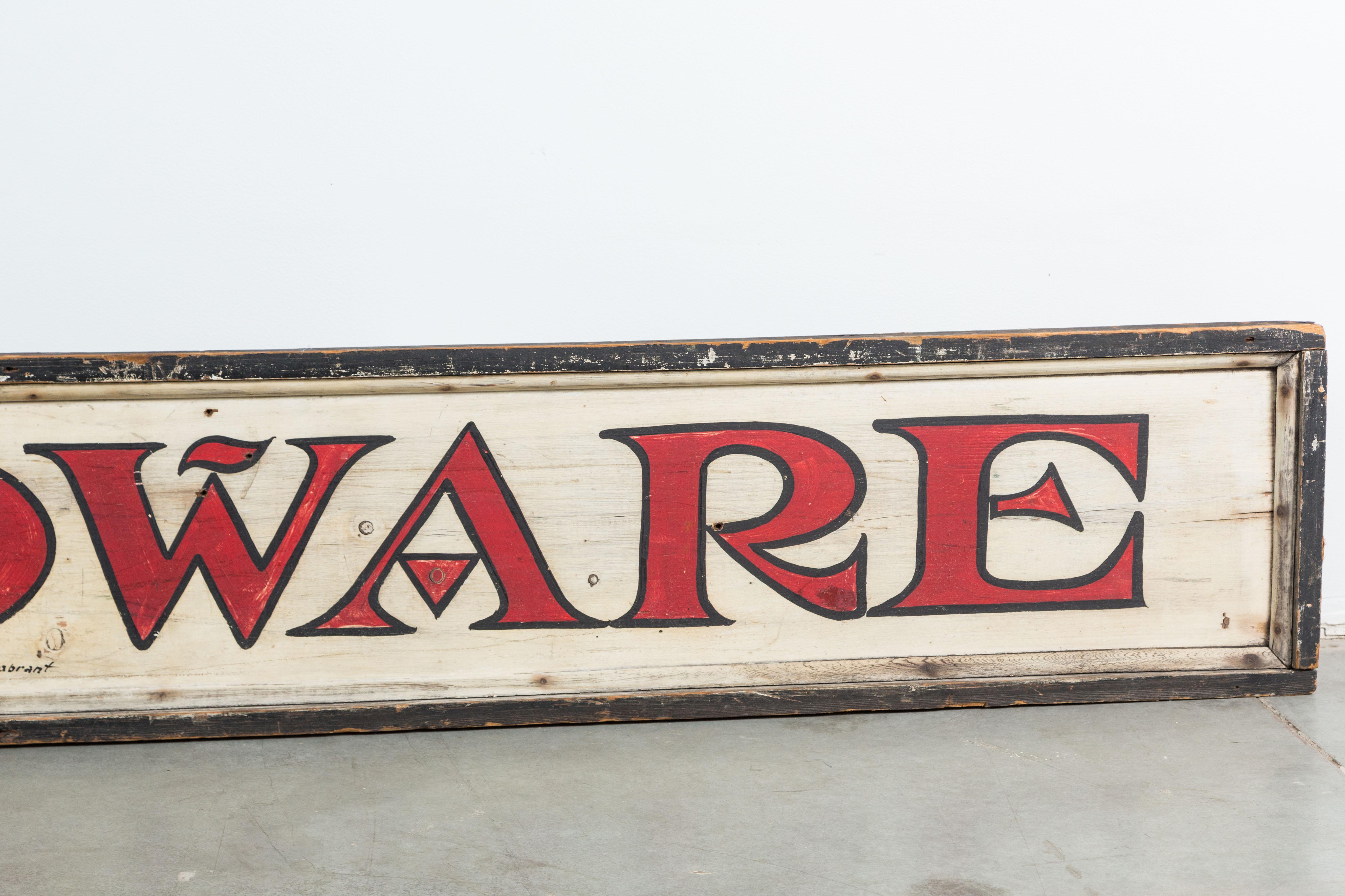 General store HARDWARE department sign. Made and signed by professional sign maker. Excellent red and black hand lettering. Simple and graphic, circa 1900.