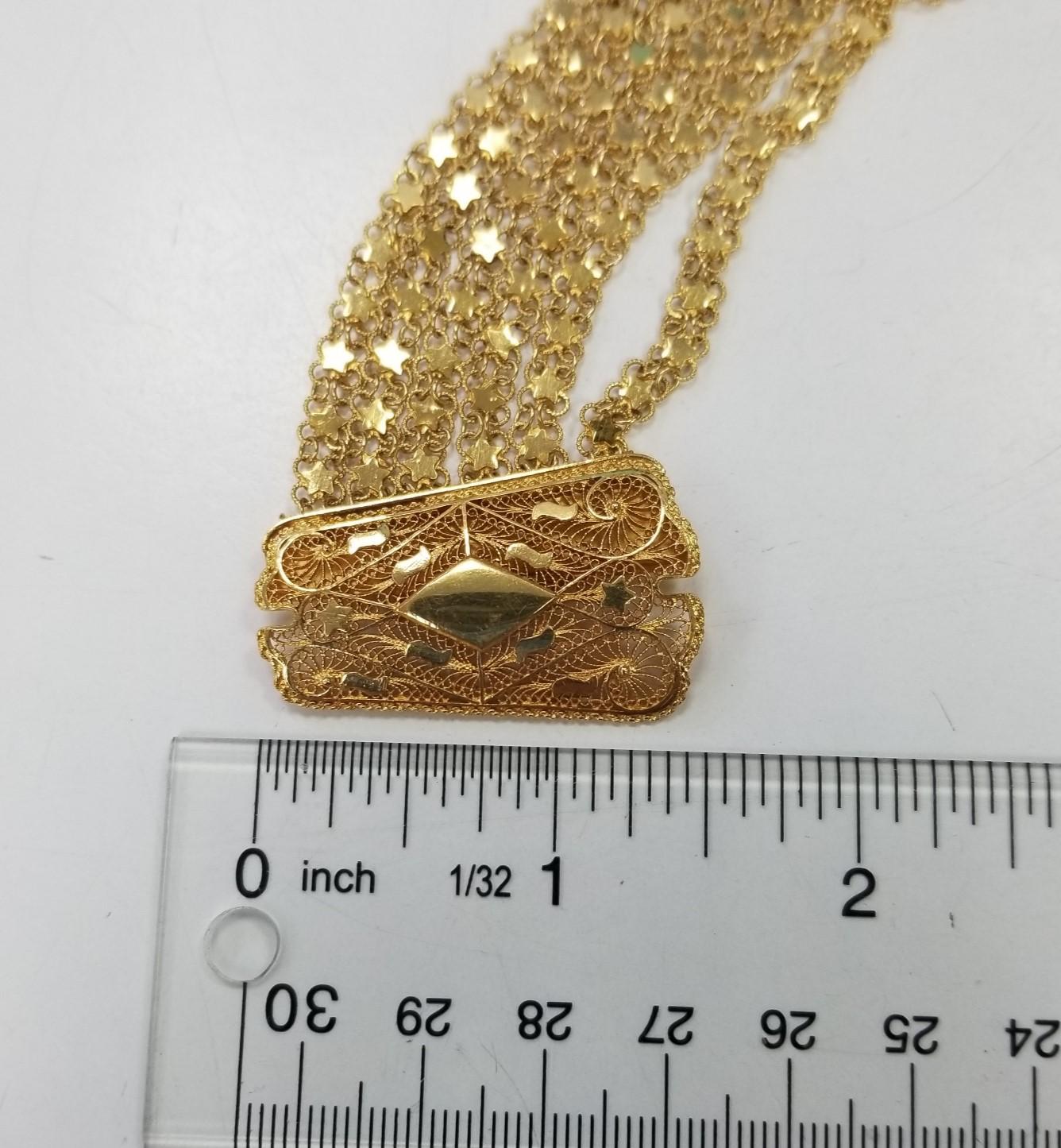  Montre-bracelet vintage Geneve en or jaune 14 carats tissé et corde avec pompons Unisexe 