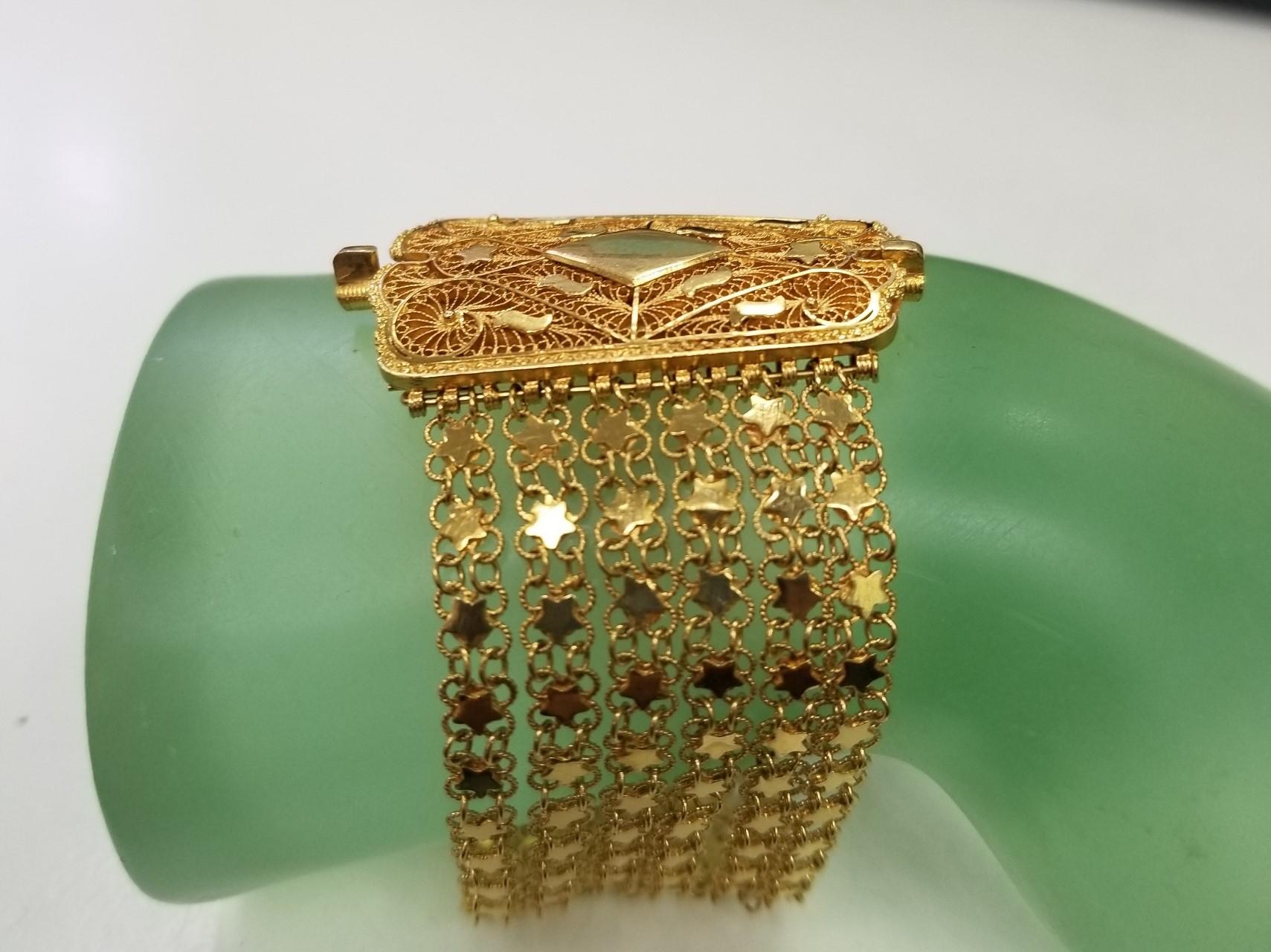 Montre-bracelet vintage Geneve en or jaune 14 carats tissé et corde avec pompons 3