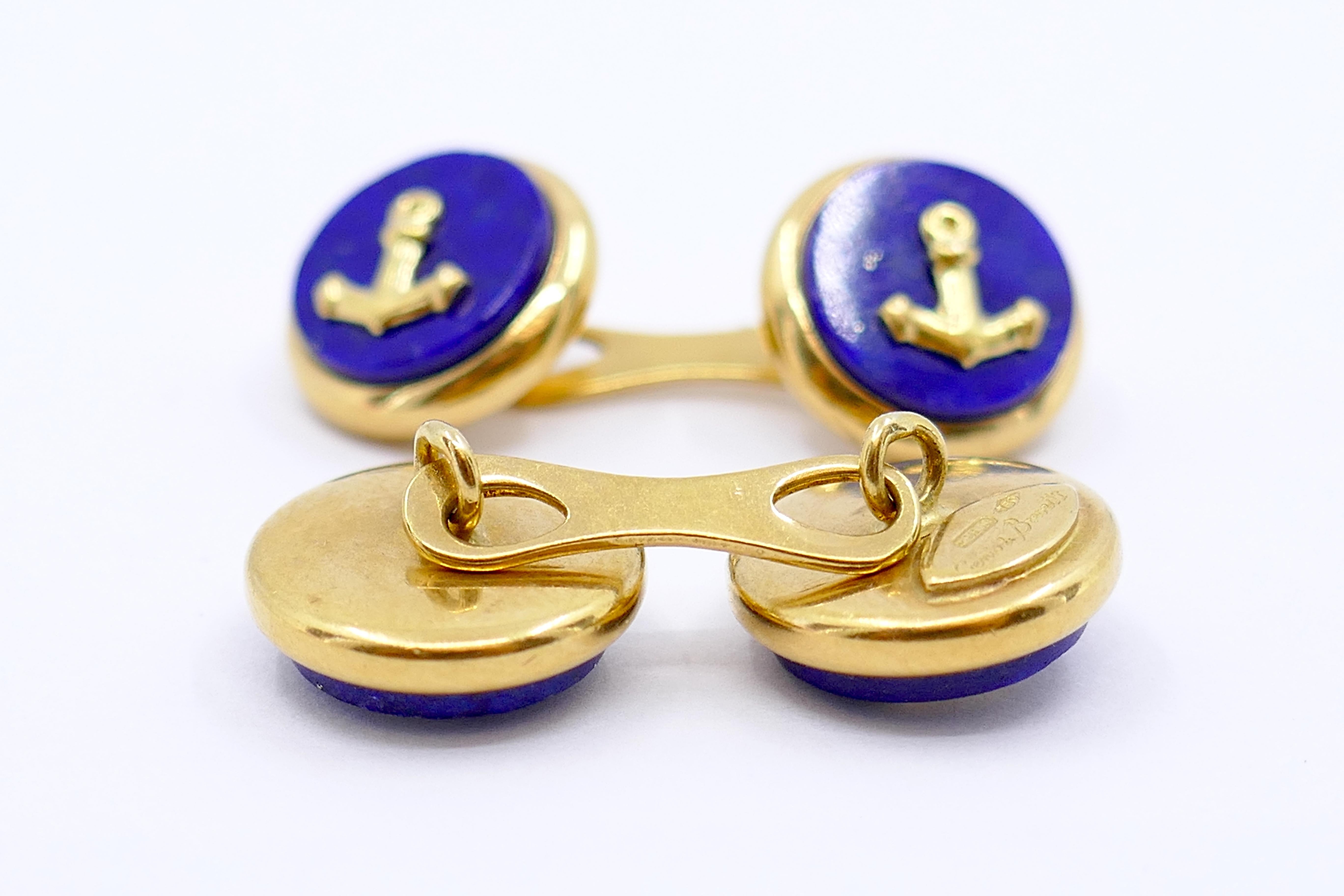 These cufflinks, crafted in Europe during the 1980s, are a testament to both style and craftsmanship. Designed by Genio & Brevetti, they showcase a nautical anchor motif, a symbol of strength and stability. Crafted from lapis lazuli, they feature