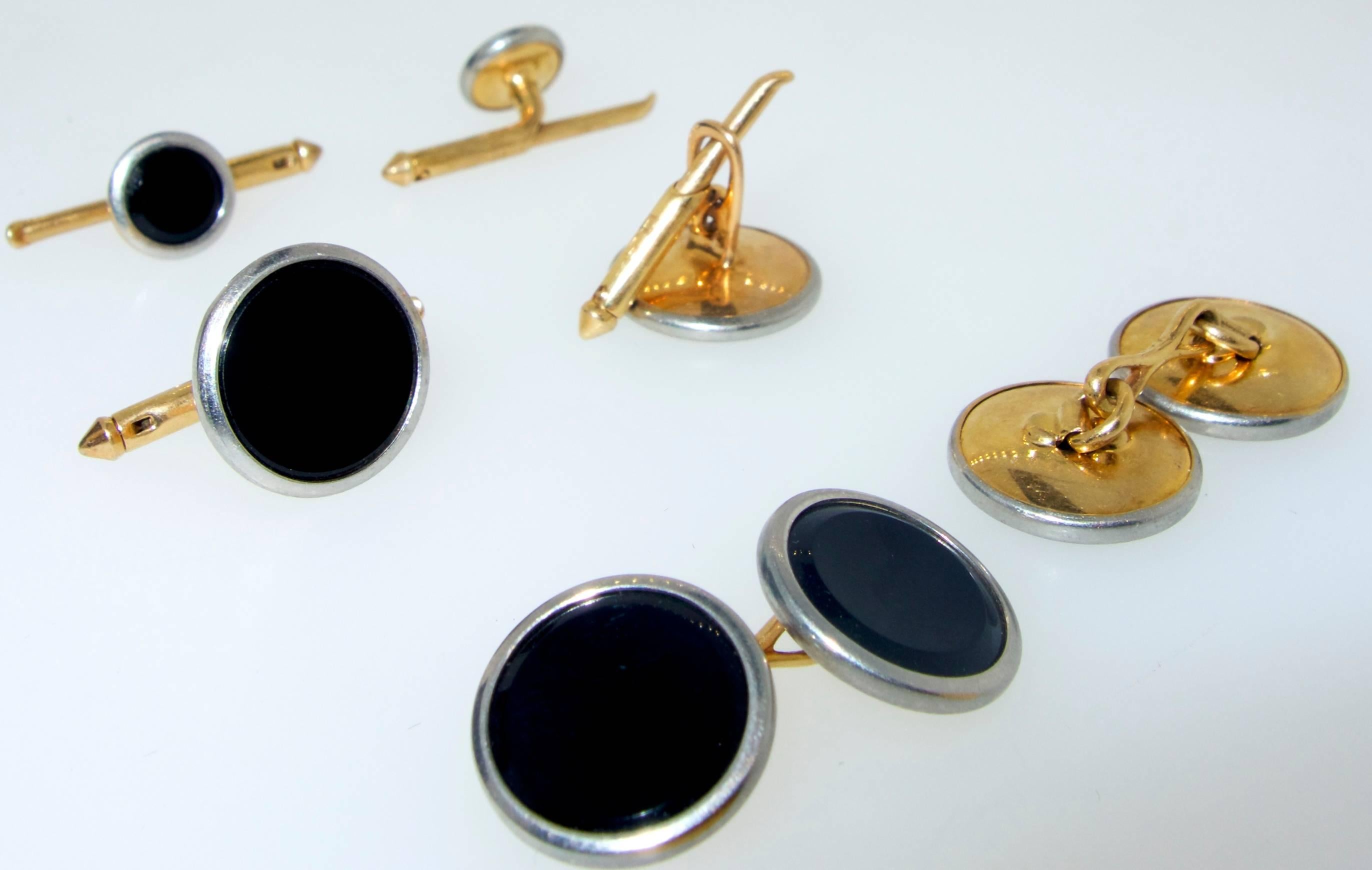 Onyx is rimmed with white gold and backed with yellow gold, made in the 1930s, this is a full dress set meaning in addition to the back to back cufflinks are three shirt studs and four vest buttons.  With today's shirts one can also wear the four