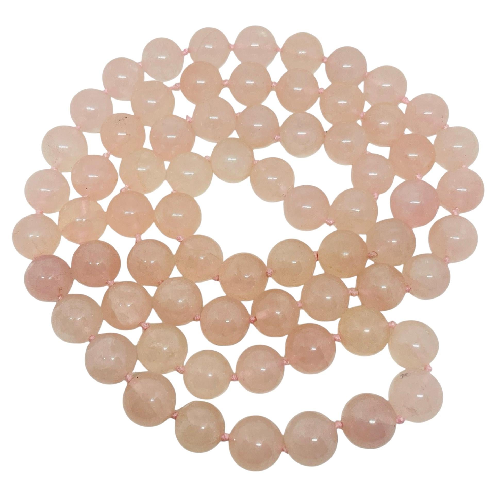 Long collier vintage composé de perles de quartz rose authentique, noué à la main