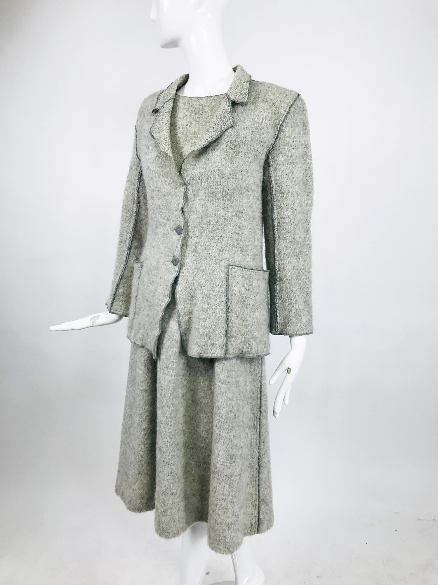 Vintage Geoffrey Beene Beene Bag knitted mohair jacket and dress from the 1970s. The Beene Bag line of women’s wear used the same silhouettes as his couture line. This two piece set is light grey shaggy mohair knit, both pieces are unlined. the