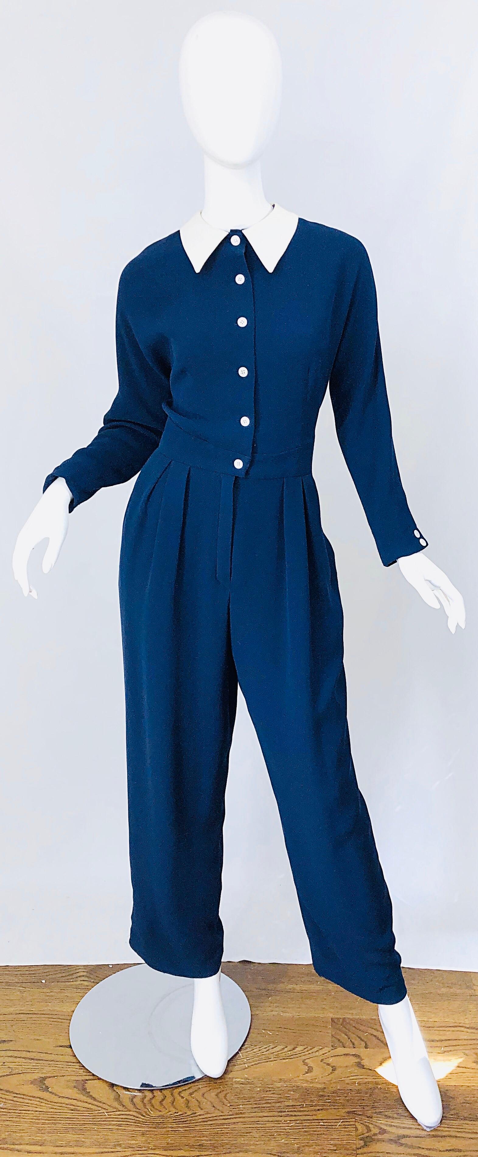 Chic vintage 80s GEOFFREY BEENE navy blue and white long sleeve silk jumpsuit ! Features a luxurious double sided silk. Buttons up the front with hidden hook-and-eye closure at top button. POCKETS at each side of the waist. White pique cotton