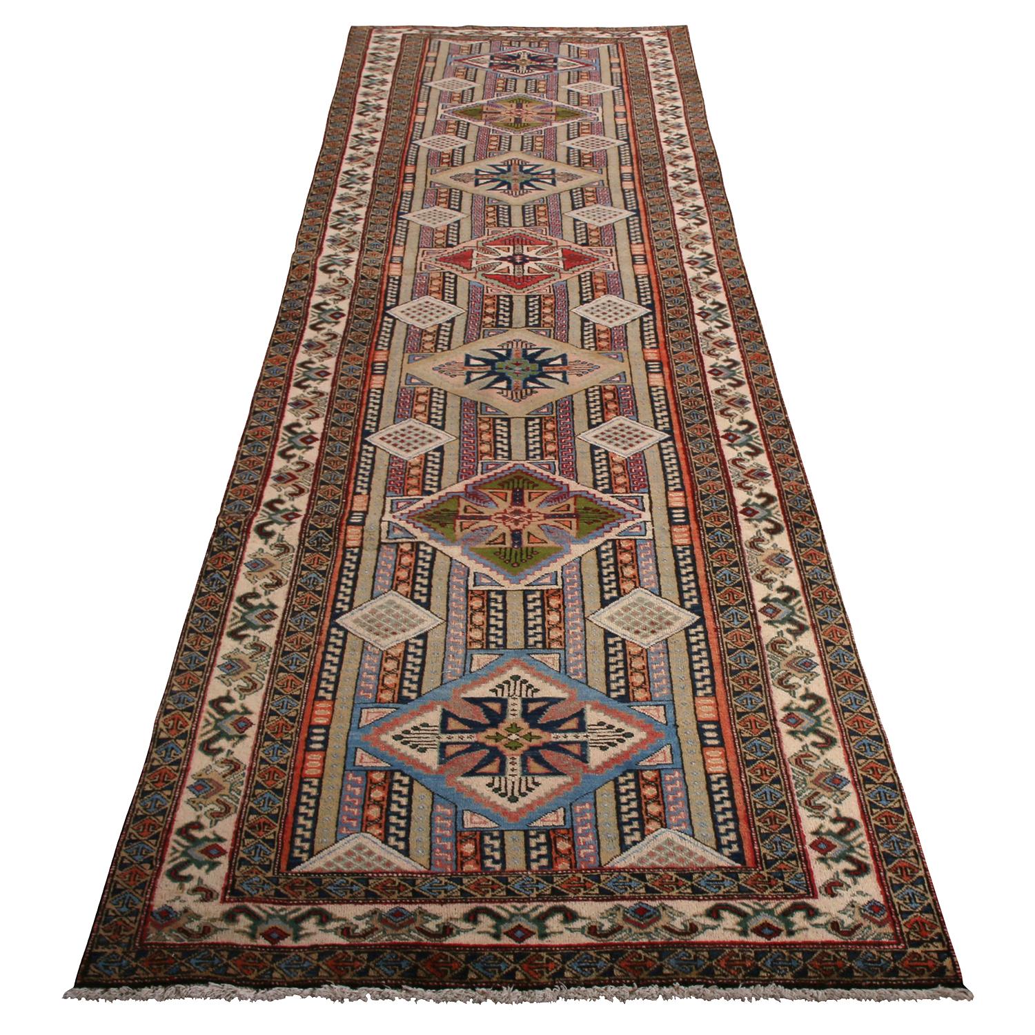 Hand knotted in lush wool pile originating from Persia between 1950-1960, this vintage midcentury Azerbaijan runner enjoys both excellent condition and a notably meticulous, skillful achievement in the play of geometry and colorway variation in this
