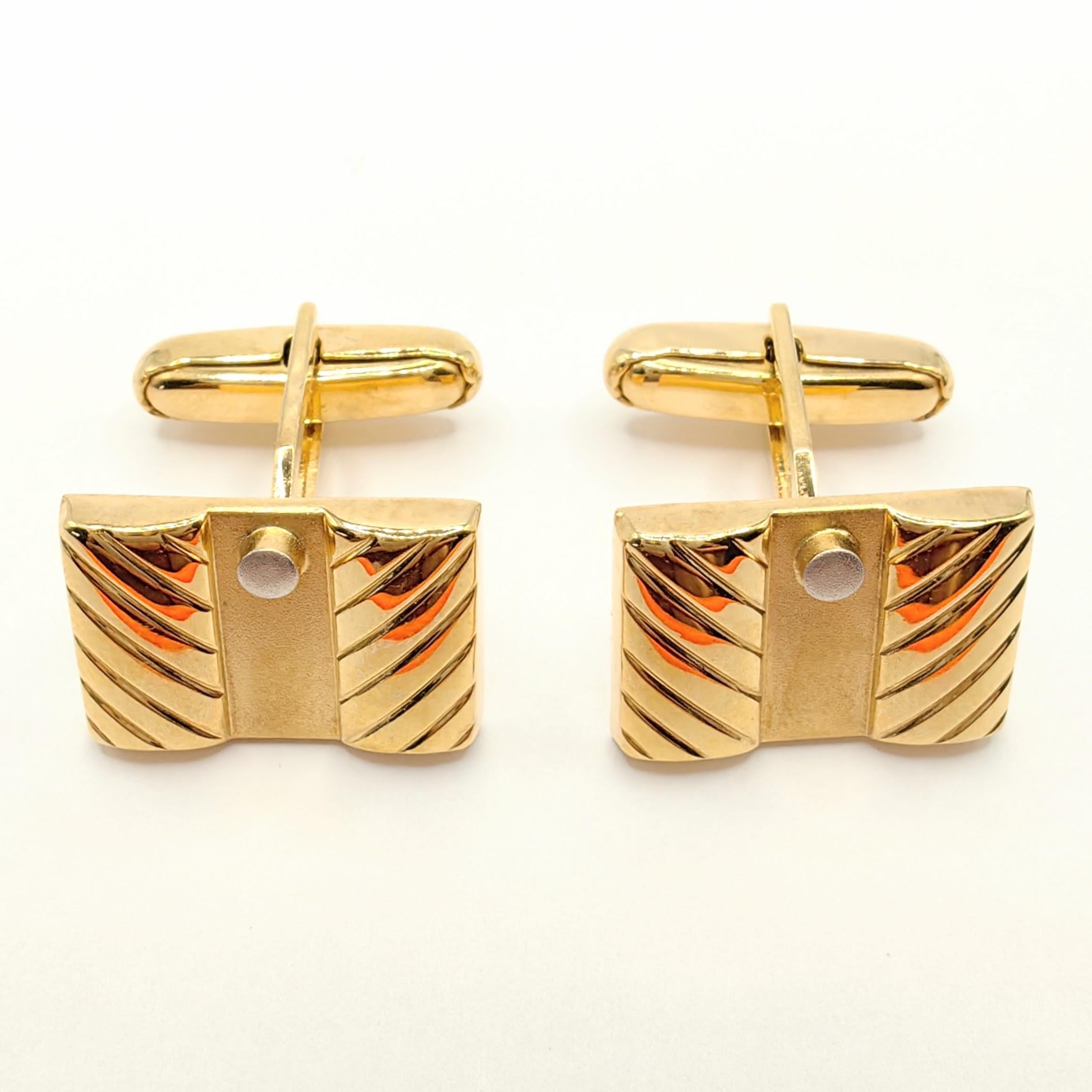 Introducing our Vintage Geometric Design Cufflinks in 18K Yellow & White Two-tone Gold, a stunning accessory that combines classic elegance with a modern touch.

These exquisite cufflinks feature a captivating geometric design that is sure to