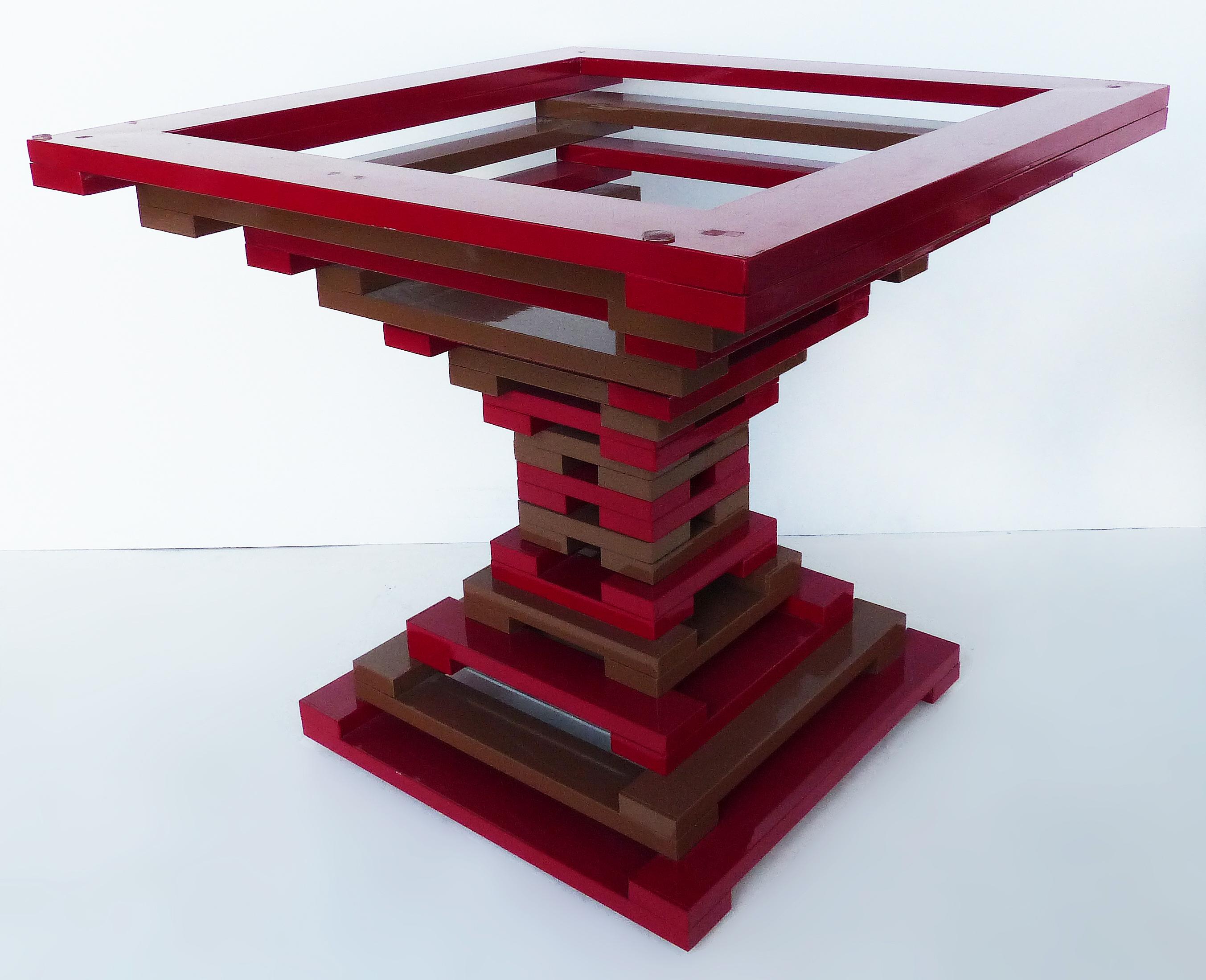 Vintage geometric enameled metal center table with glass top

Offered for sale is an enameled metal geometric center table in red and chocolate enameled finish and square glass top. This is a wonderful decorative statement piece and is versatile