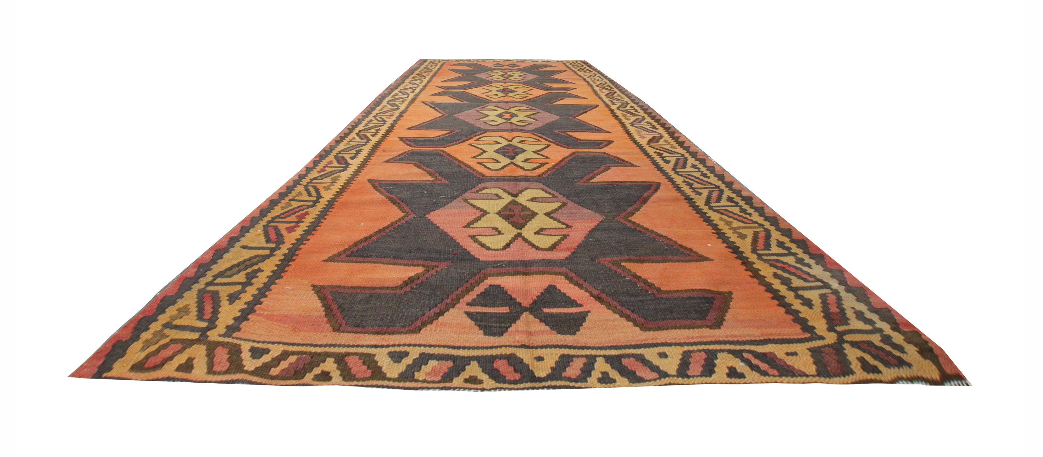 This vintage fine wool kilim features designs and patterns that derive from Caucasian Weavers of Azerbaijan in the 1960s. The Kelim flat weave rug is all-natural and completely handmade using the best organic hand-spun wool and cotton. In addition,