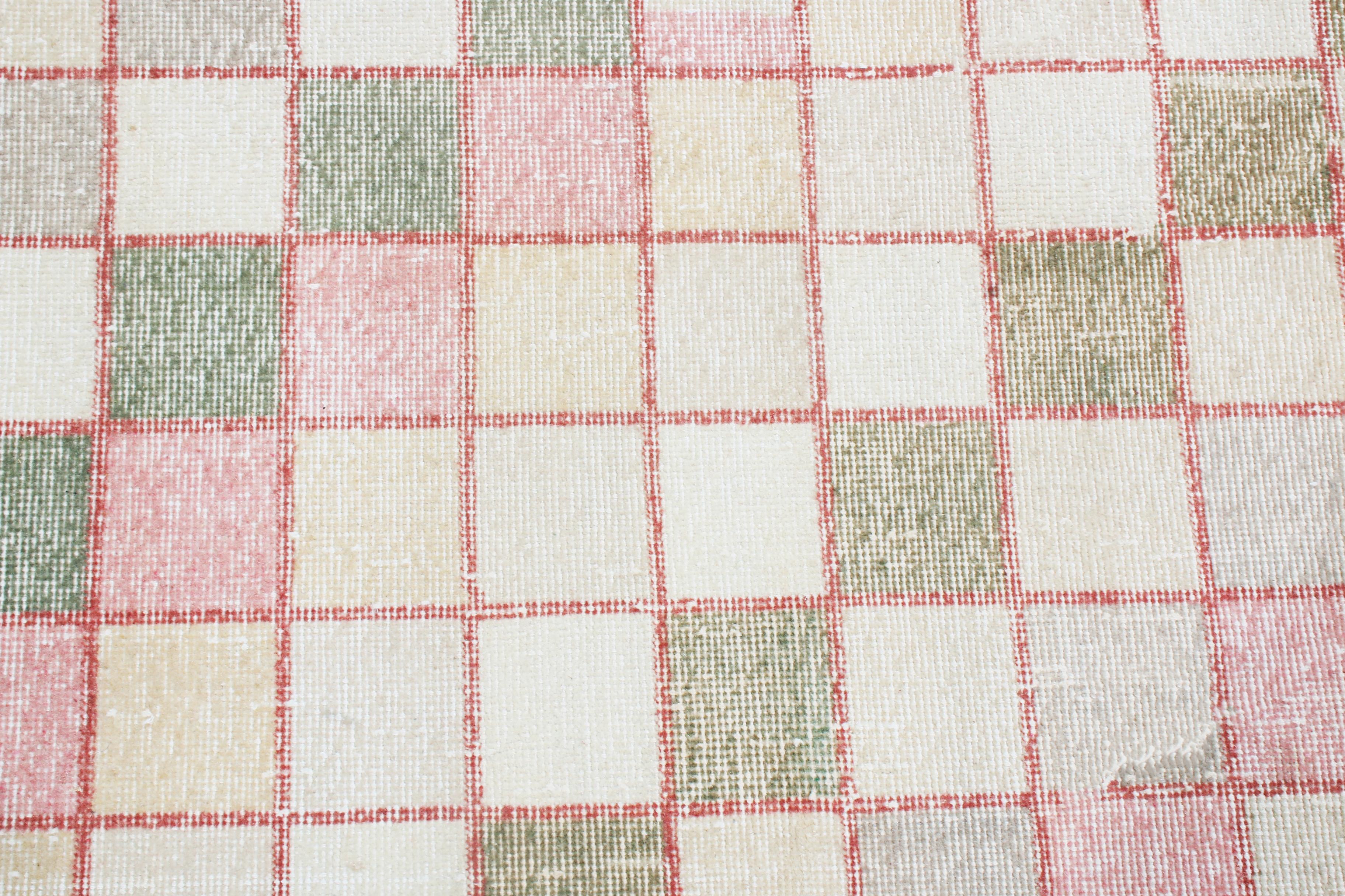 pink and green vintage rug