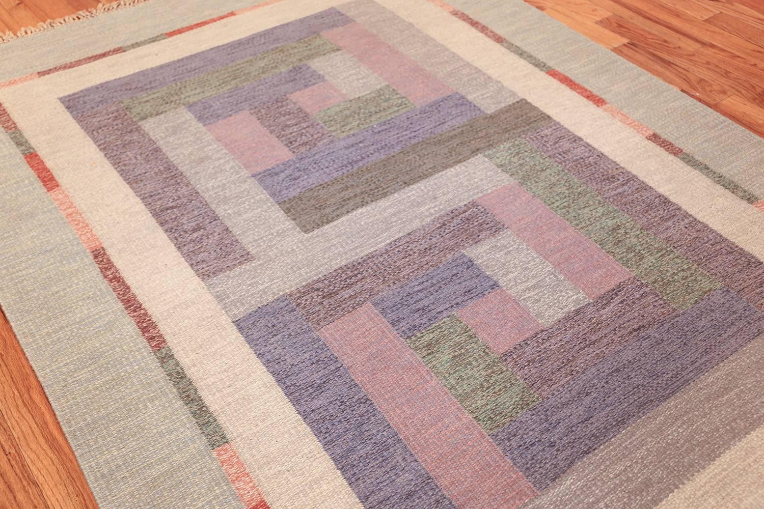 Magnificent Signed “NN” Vintage Geometric Swedish Scandinavian Kilim Rug, Country of Origin / Rug Type: Scandinavia, Circa Date: Mid 20th Century. Size: 5 ft 5 in x 8 ft (1.65 m x 2.44 m).