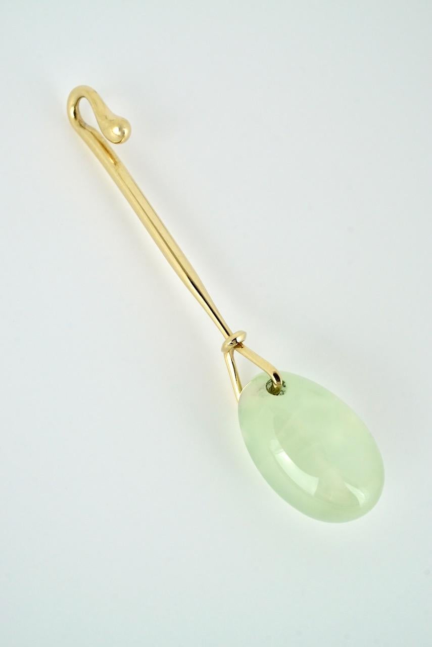 A vintage 18k yellow gold Prehnite bead drop pendant consisting of a shepherd hook style pendant with a drop shaped rounded green Prehnite stone suspended from the base - this design is known as the Dew Drop Pendant - effortless and timeless, this