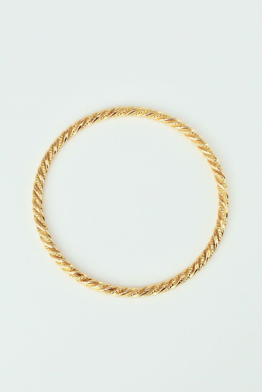 A rare vintage 18k yellow gold heavy plain and wire twist rope design bangle - great stacked as part of a collection or worn just on its own - any items crafted in gold prior to 2000 are considered rare as the overwhelming majority of items were