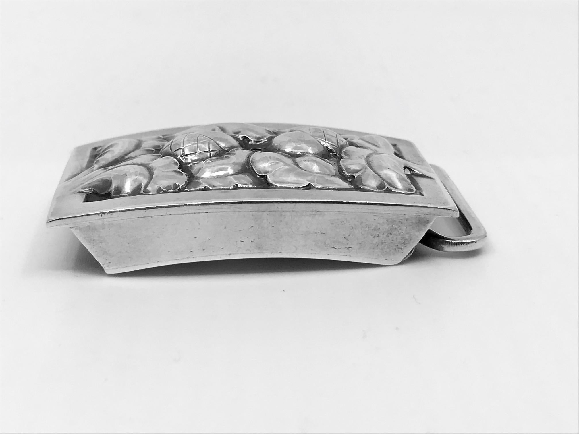 Vintage sterling silver belt Georg Jensen buckle with a front panel of leaves and acorns, design #67.
Measures 2 1/4