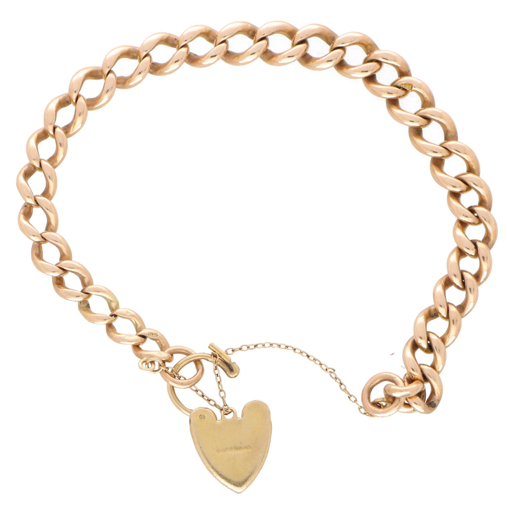 Vintage Georg Jensen Flat Curb Heart Lock Charm Bracelet in 9k Rose Gold In Good Condition In London, GB