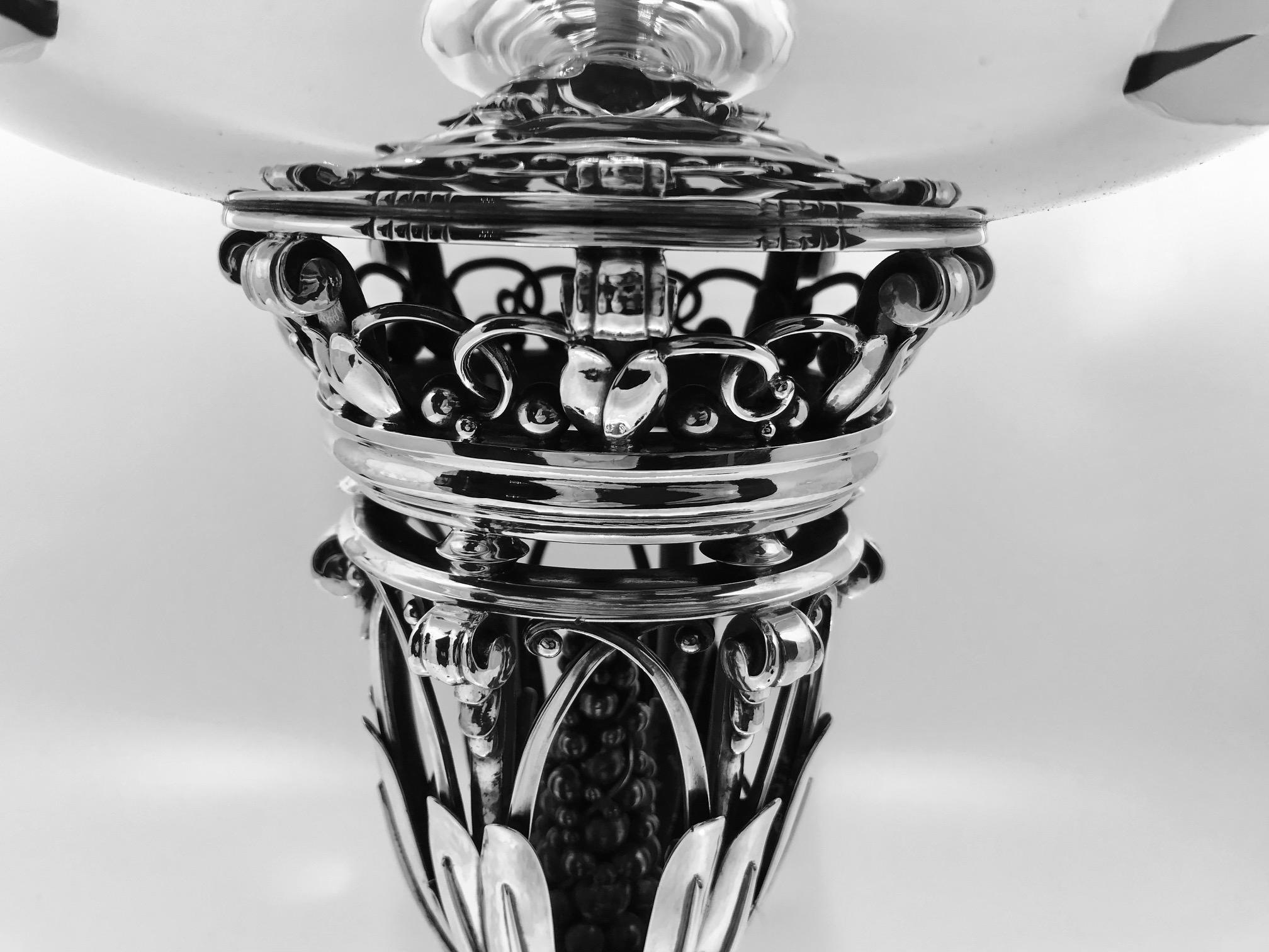 This is an impressive sterling silver Georg Jensen Centerpiece bowl, design #250B by Johan Rohde from 1917.

Measures an impressive 13