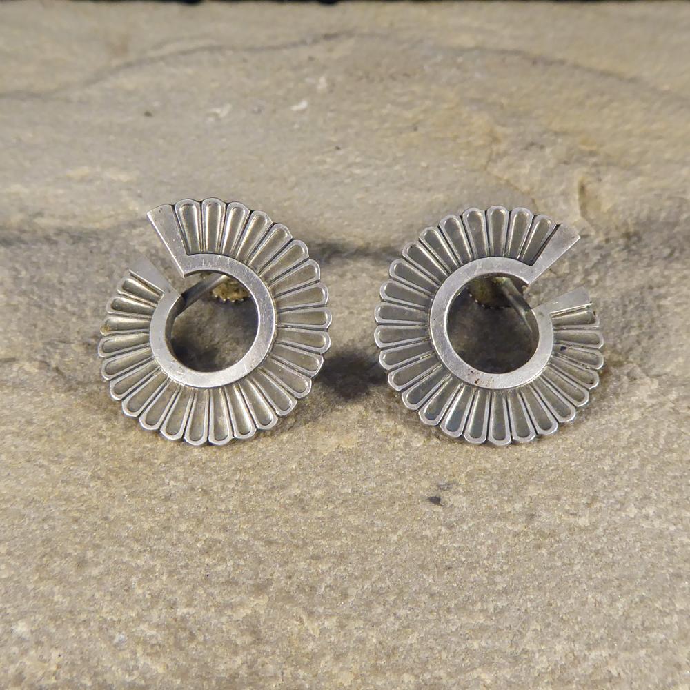 These Vintage Georg Jensen Earrings are created to resemble a textured swirl #92 are modelled in Sterling Silver with clear marks on the back. Gorgeous and graceful, they will add a touch of beauty to your look with screw in backs.

Condition: Very