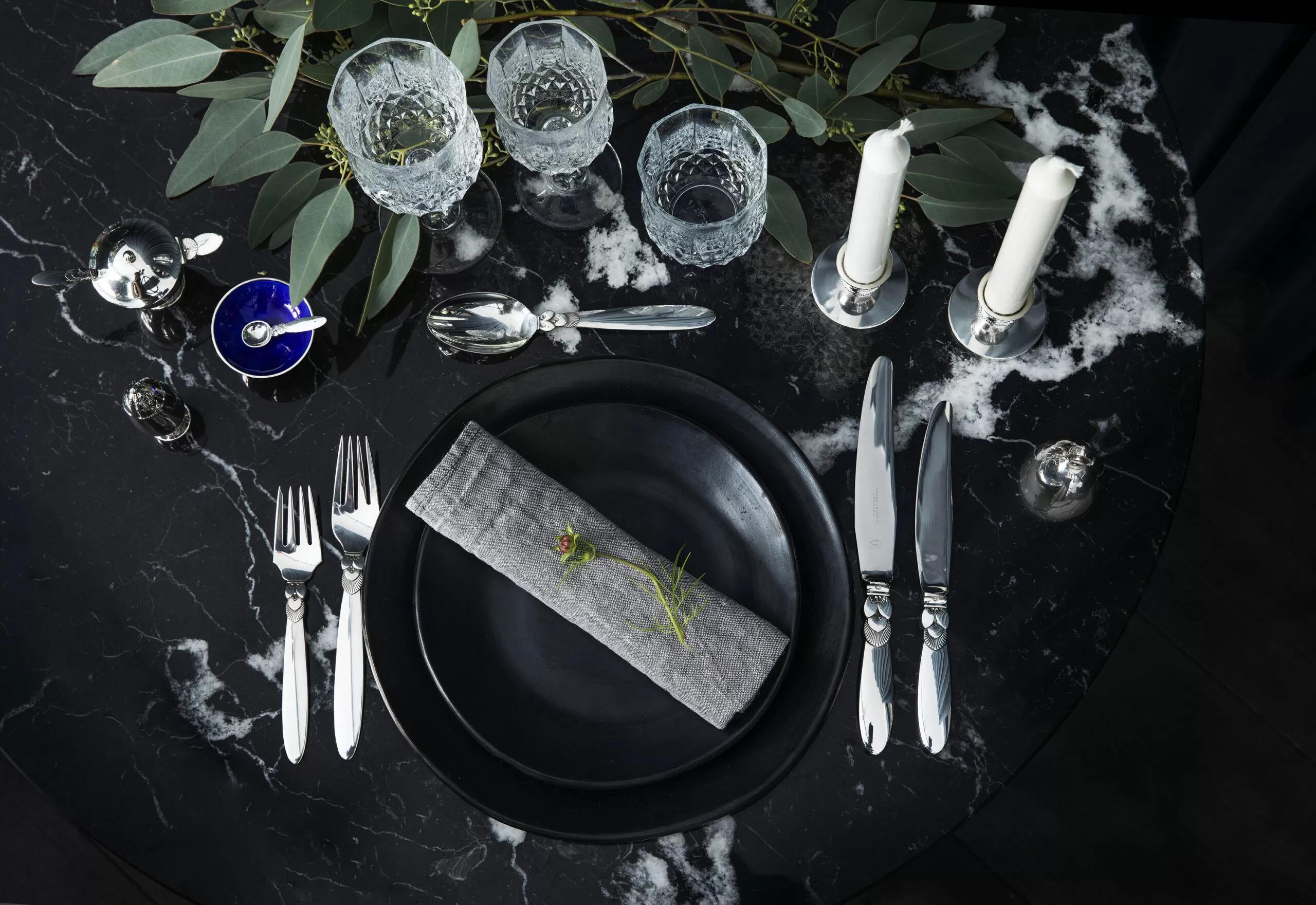 An extensive 141 piece Georg Jensen sterling silver Cactus silverware service for twelve persons. It was created by sculptor Gundorph Albertus in 1930. The lines are simple and strong and his sensitivity for Silver´s character are clearly pronounced