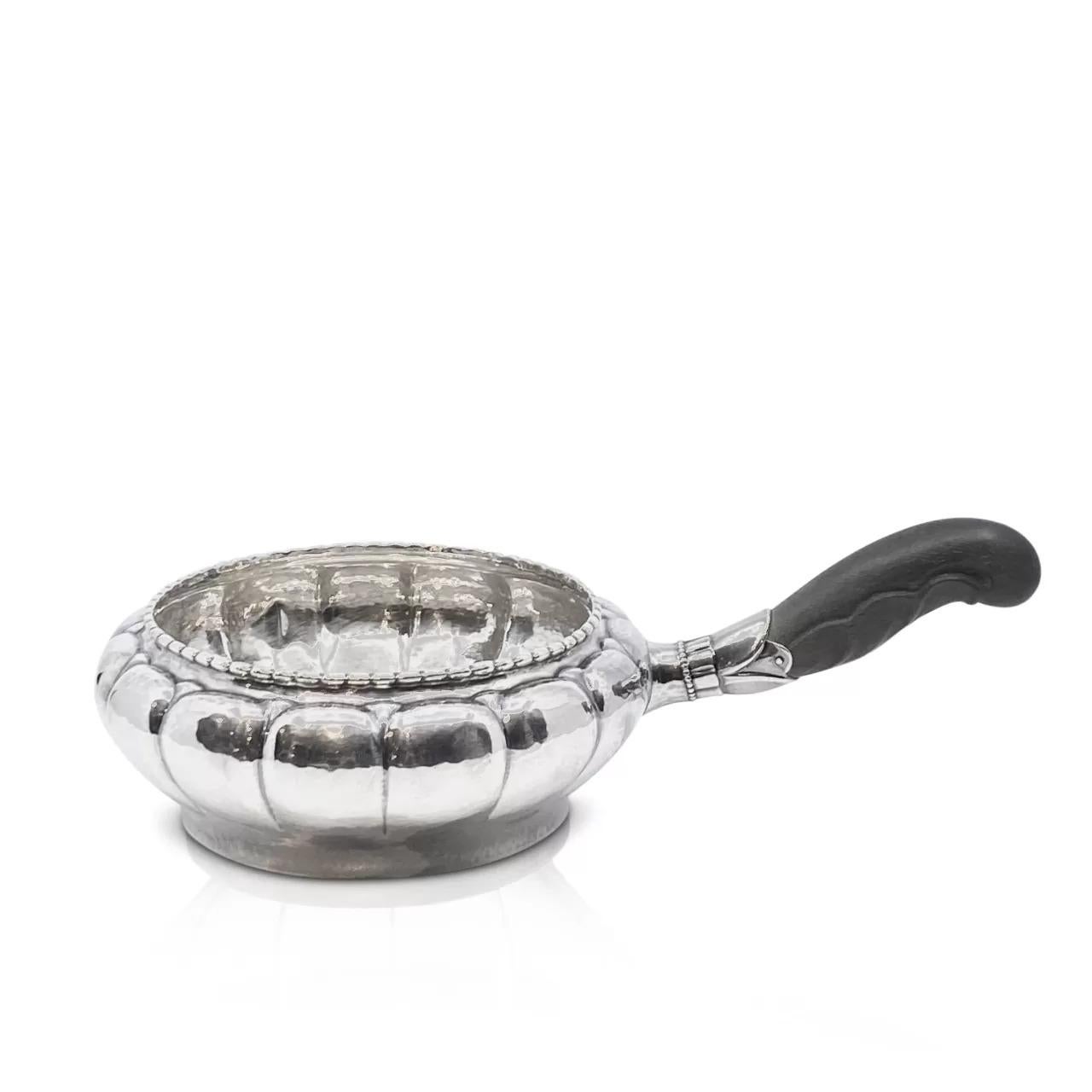 Vintage sterling silver Georg Jensen casserole with beautifully hand-carved ebony handle, design #3 by Georg Jensen from circa 1914.

Dimensions: The actual casserole measures 6 1/2