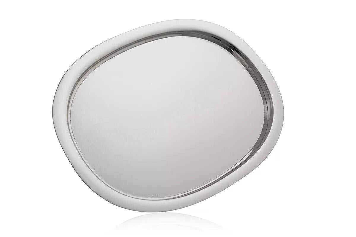 Bandeja Georg Jensen vintage de plata de ley de mediados de siglo - Diseño nº 1146a de Piet Hein. Esta elegante bandeja vintage, fabricada por Georg Jensen y diseñada por Piet Hein en 1966, presenta una elegante forma elíptica con un borde curvo en