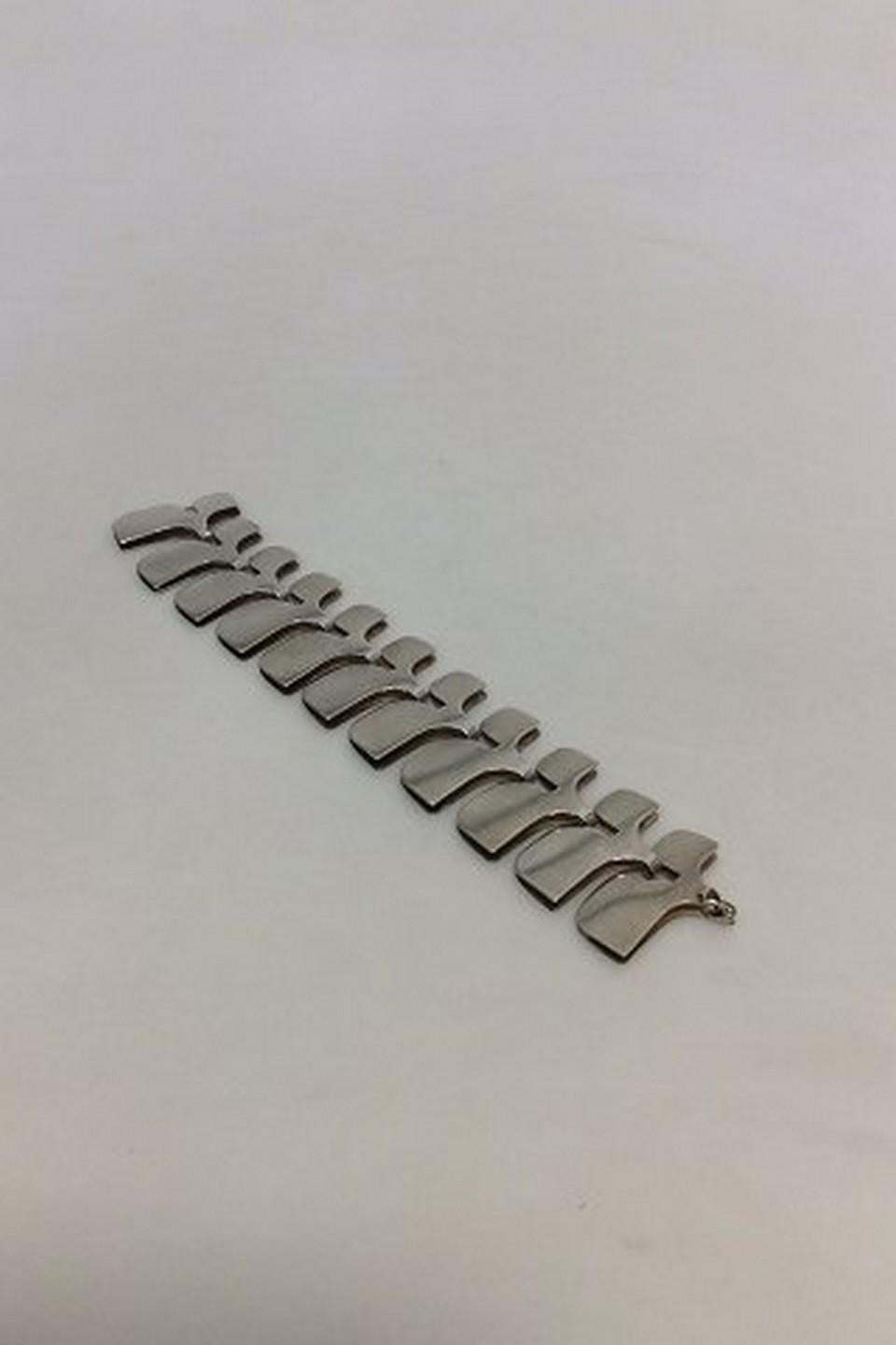 Vintage Georg Jensen Sterling Silver Wide Bracelet by Ibe Dahlquist no 149A.
Measures 21,7cm and 3,9cm wide. (8.54