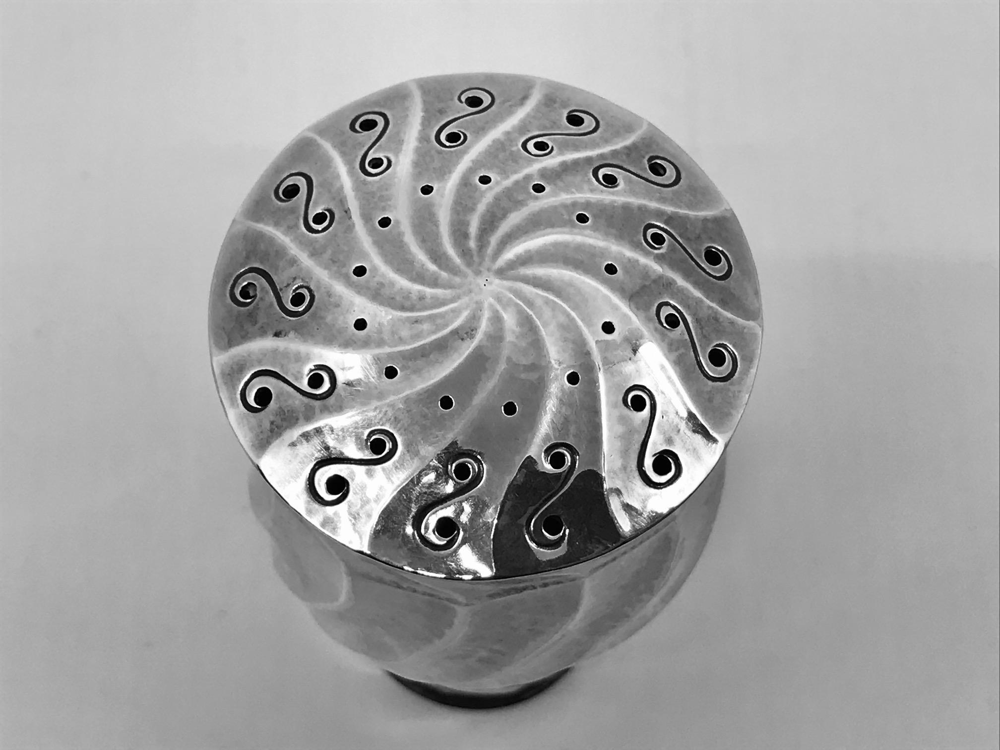 Sterling silver Georg Jensen sugar caster, design #276 by Johan Rohde from circa 1918.

Measures 4? in height, diameter at top 2 1/8? (10.2cm, 5.5cm).

Vintage Georg Jensen hallmarks and London import mark for 1924.

 