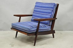 Poltrona da salotto vintage "Cushion" di George Nakashima con schienale a sponde in noce nero