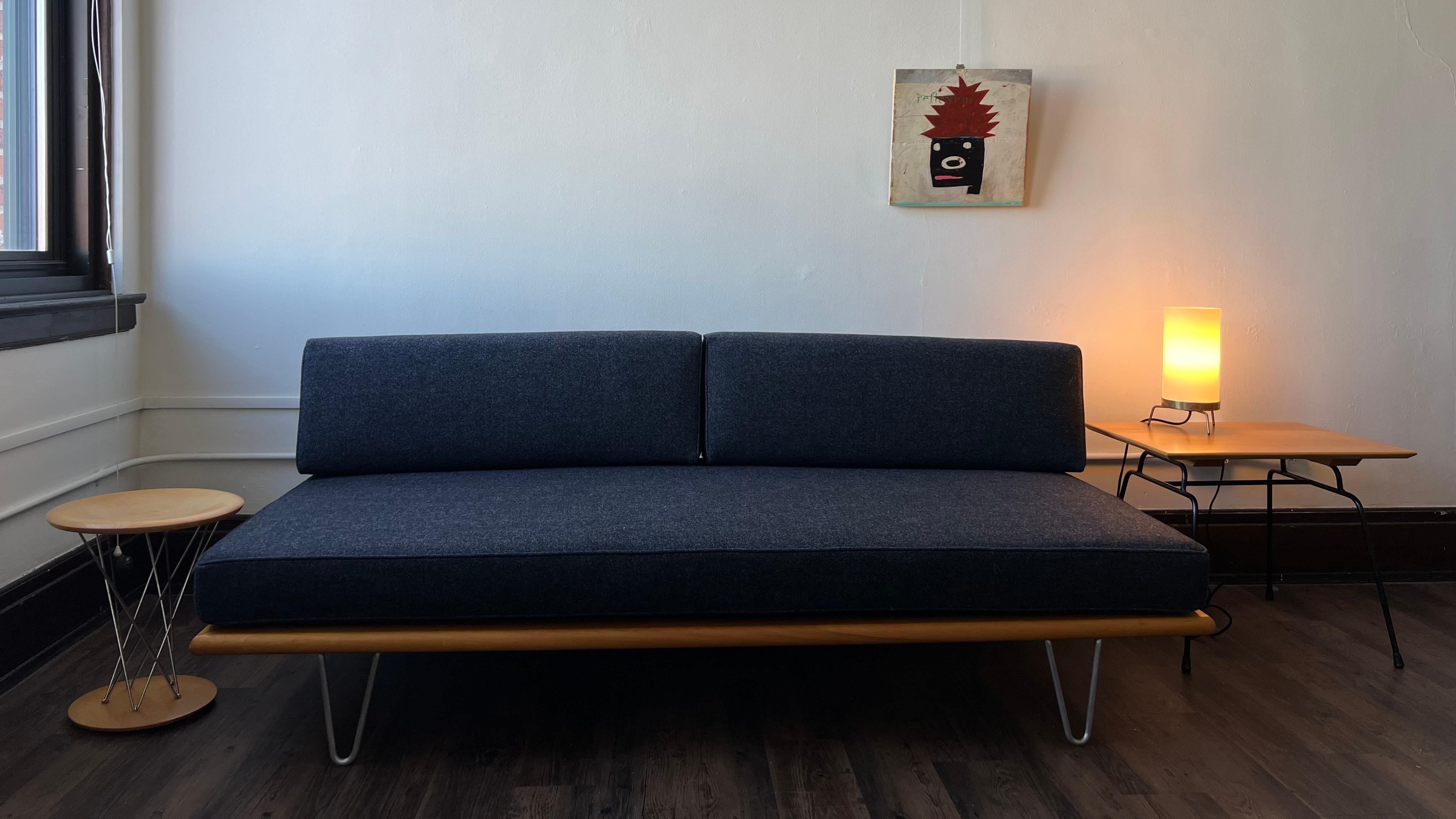 Vintage George Nelson daybed in Maharam Beck (Overshadow) and ash with hairpin legs. Completely restored from the top down - new cushions, refinished frame and cleaned legs and metal components. While restored, the wood still maintains its golden