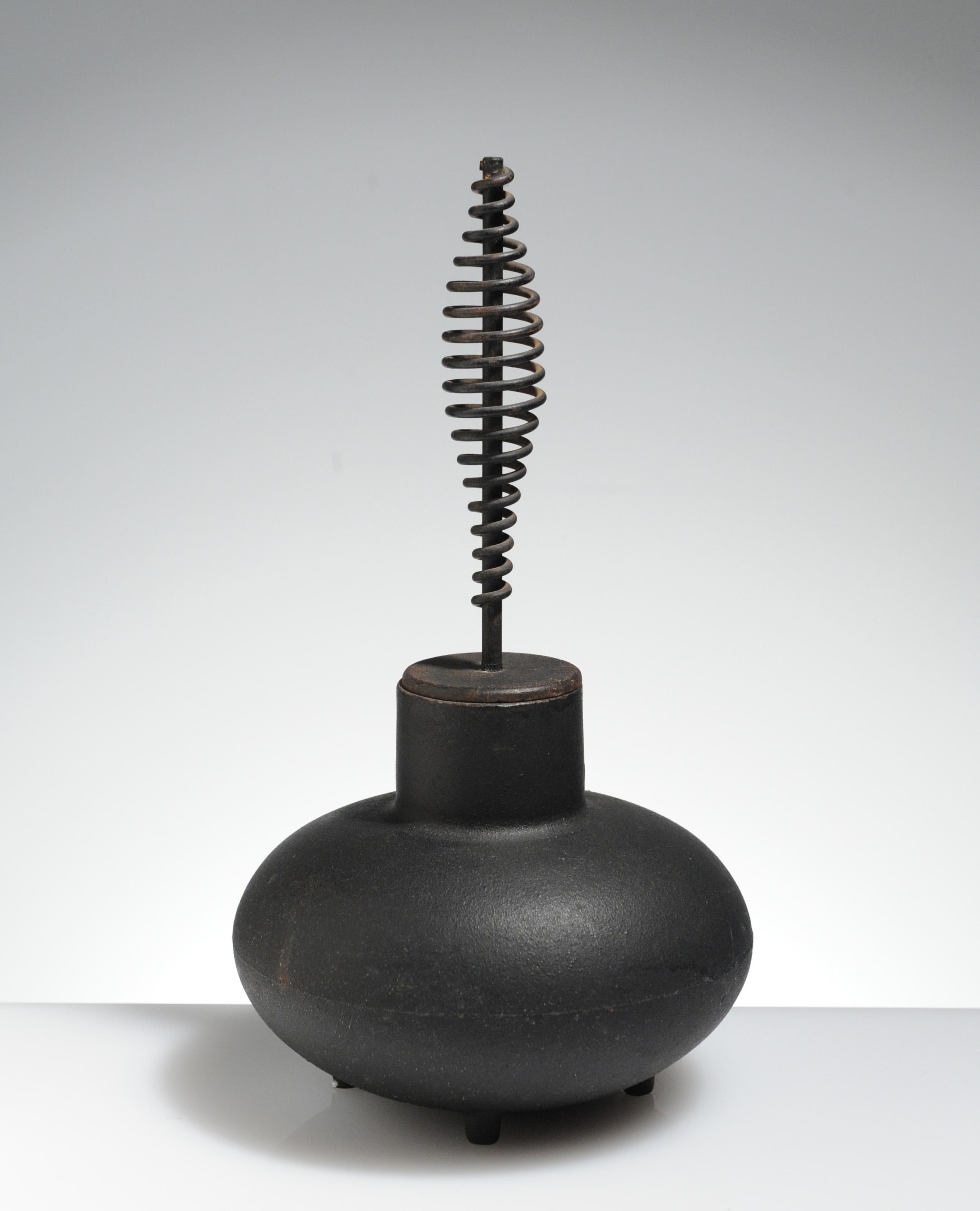 Excellent example of George Nelson designed firestarter. Made of cast iron by Howard Miller of Zeeland, Michigan.