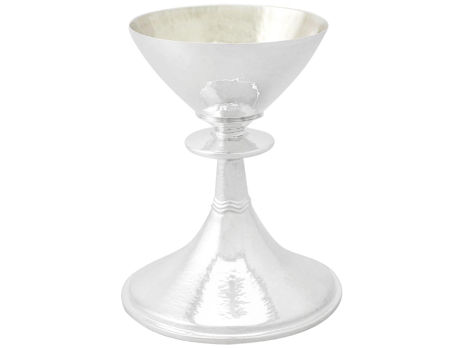 An exceptional, fine and impressive vintage George VI English sterling silver chalice in the Arts & Crafts style; an addition to our religious silverware collection.

This exceptional vintage George VI sterling silver ecclesiastical chalice has a