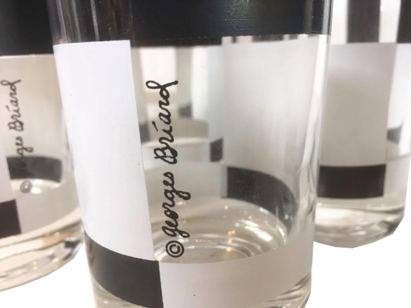Eight signed Georges Briard highball glasses. In black and white Op-Art pattern having alternating black, white and clear squares. This pattern was from his January 1969 catalogue.