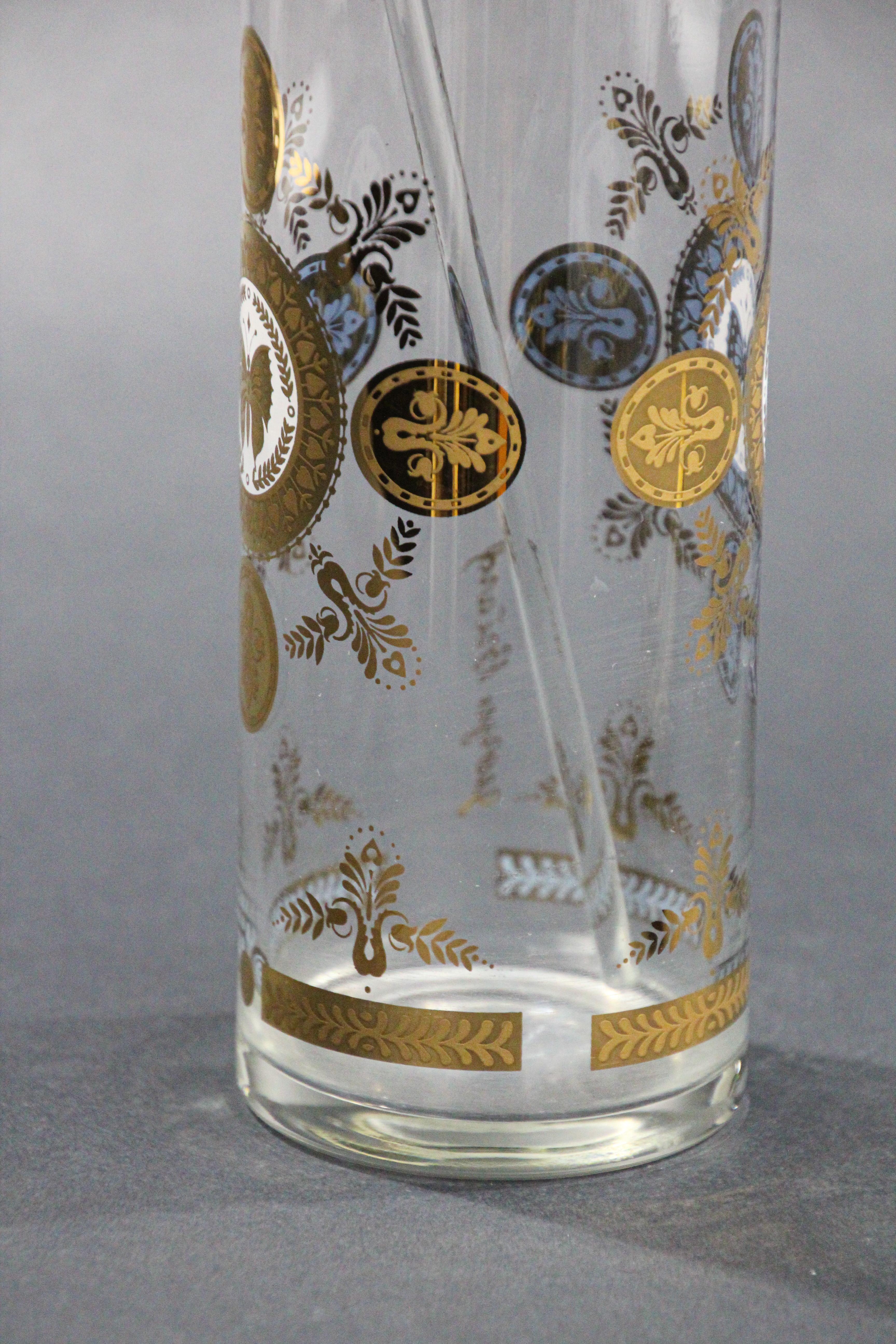 Elegant vintage midcentury Georges Briard barware pitcher with gold leaf finish.
This fabulous vintage Georges Briard pitcher barware with 22-carat gold decoration.
Gorgeous for display on any bar or bar cart, it commands attention. A 
